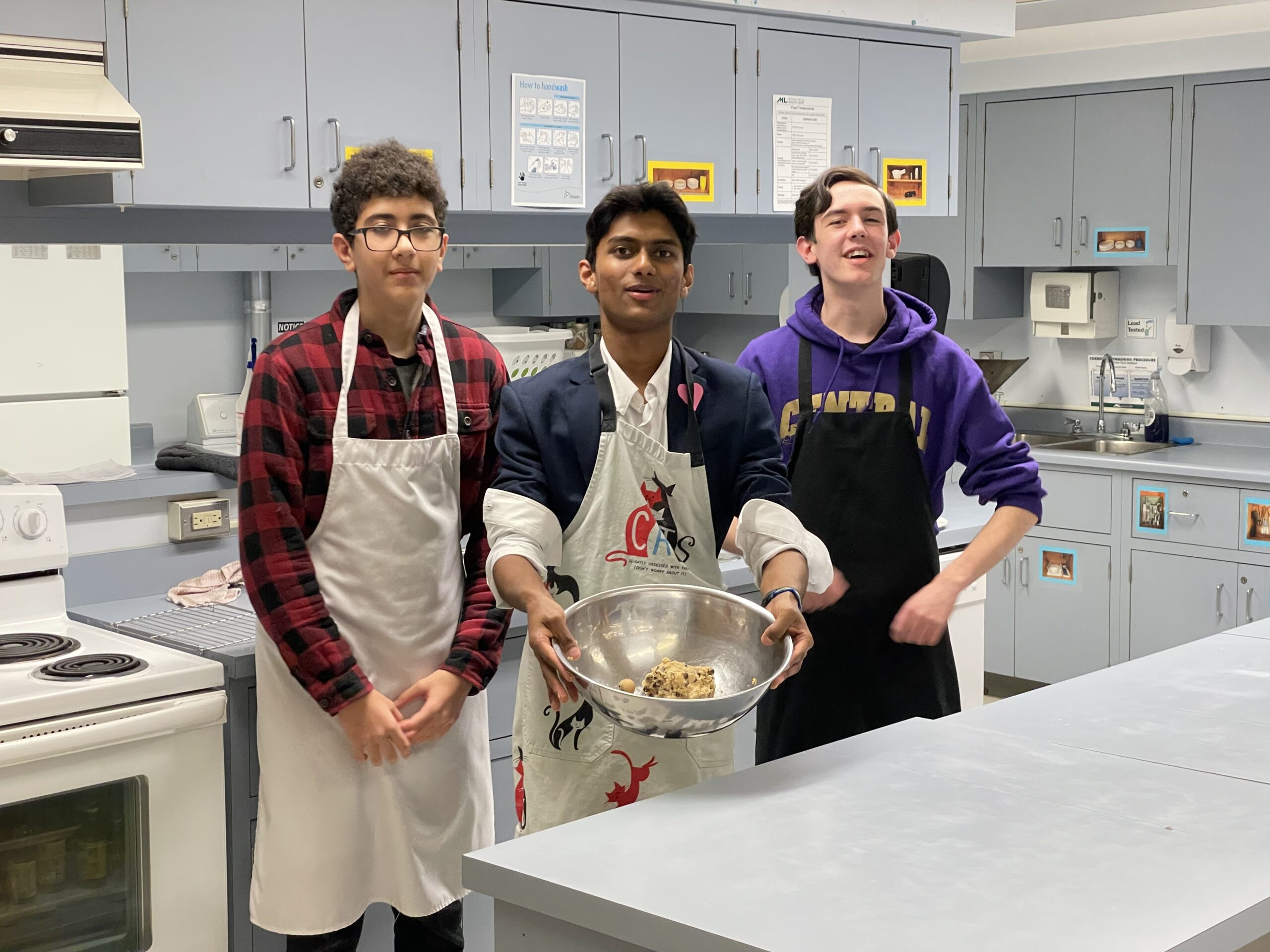Allan preparing cookies for incoming highschool students