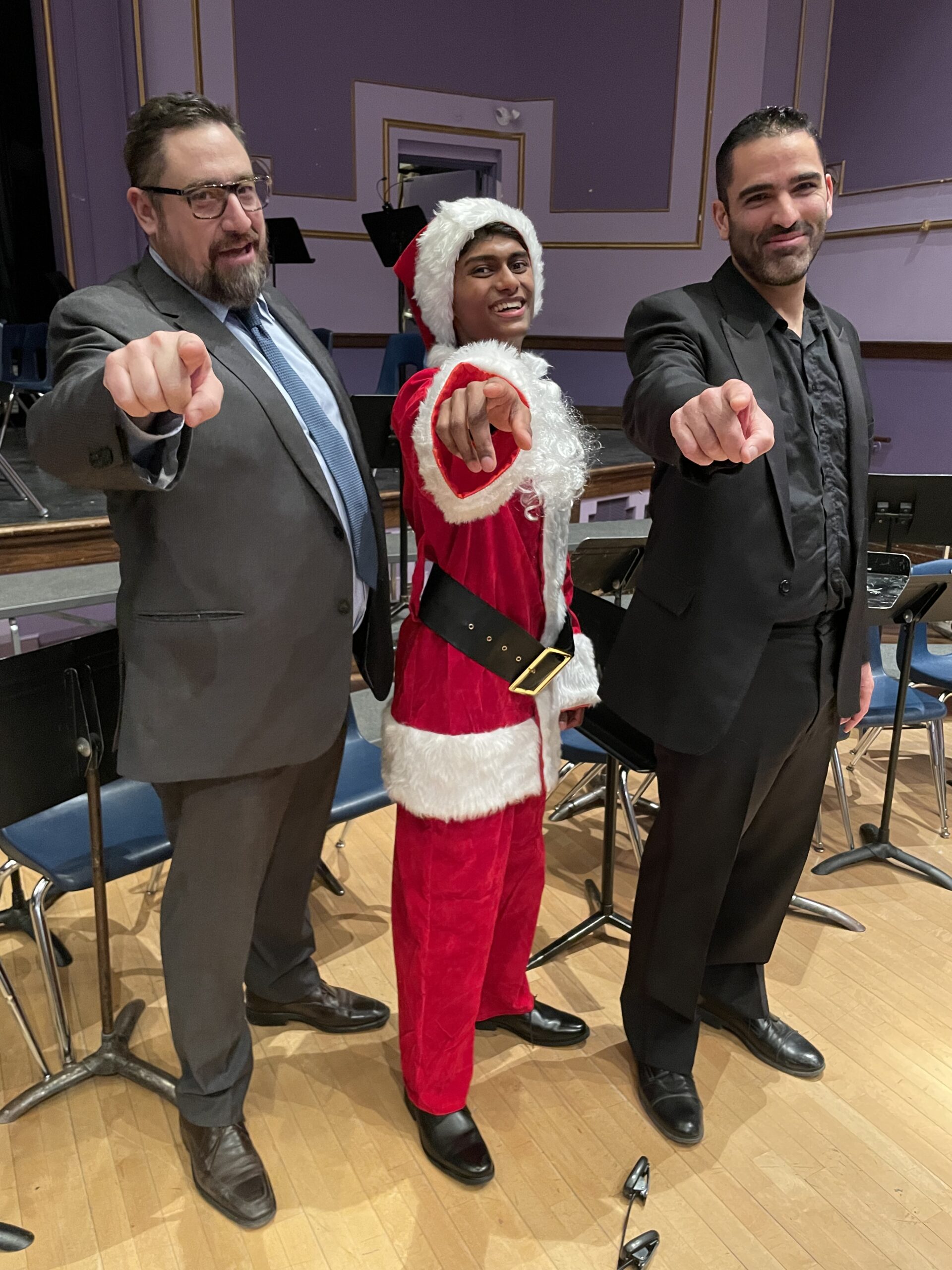 Allan with music teachers after his solo in the christmas concert