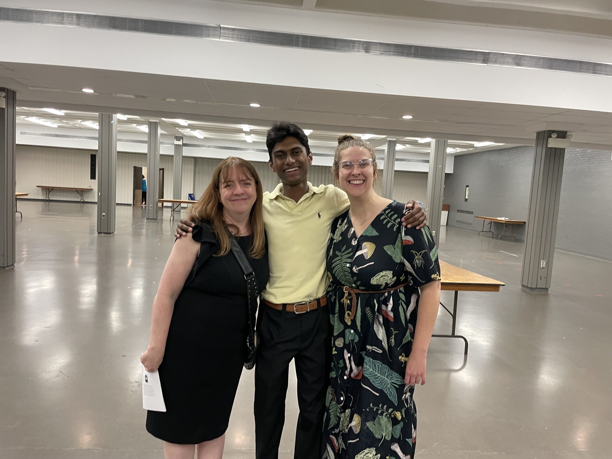 Allan with his bio teacher and swim coach